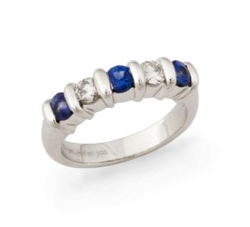 Ridge Ring 3 Sapphires and 2 diamonds alternating between the bars of platinum that hold them.