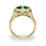 Concerto ring in yellow gold with a oval green tourmaline