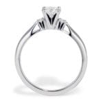3 diamond ring Round center diamond and mini side round diamonds Platinum 4 prong with airline