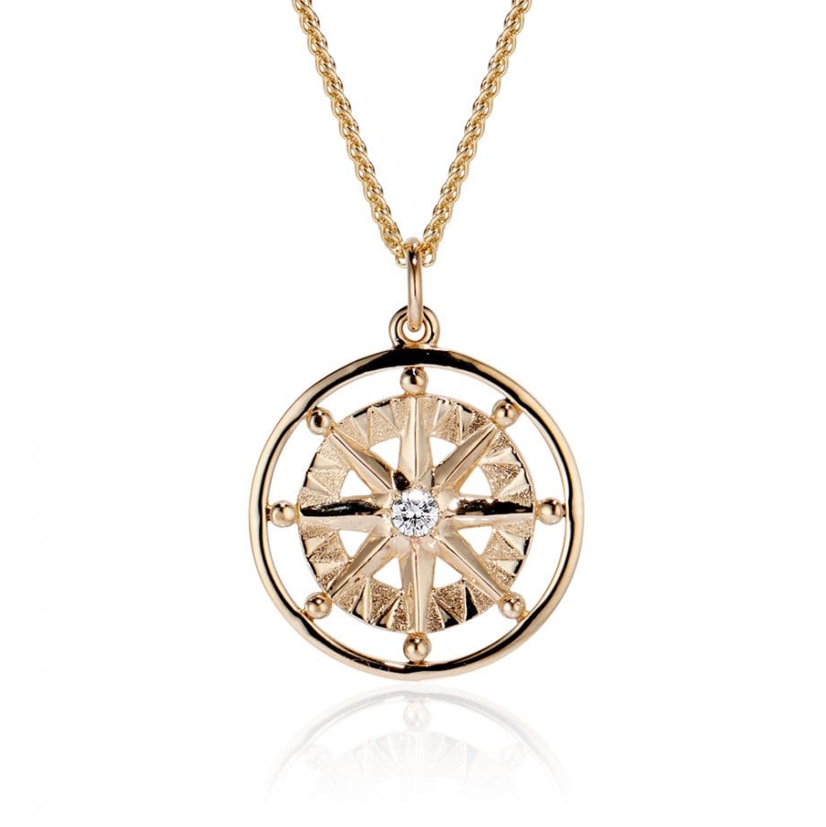 Compass rose large pendant with one diamond and frame