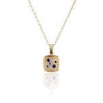 A galaxy of Diamonds and natural blue Sapphires sparkle in this 14K gold Brown Goldsmiths original cushion shaped pendant.