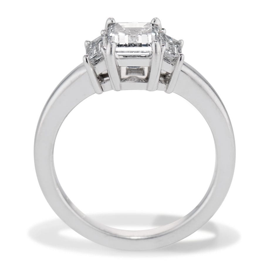 010564 - Emerald cut Diamond Engagement Ring In Platinum through the finger view