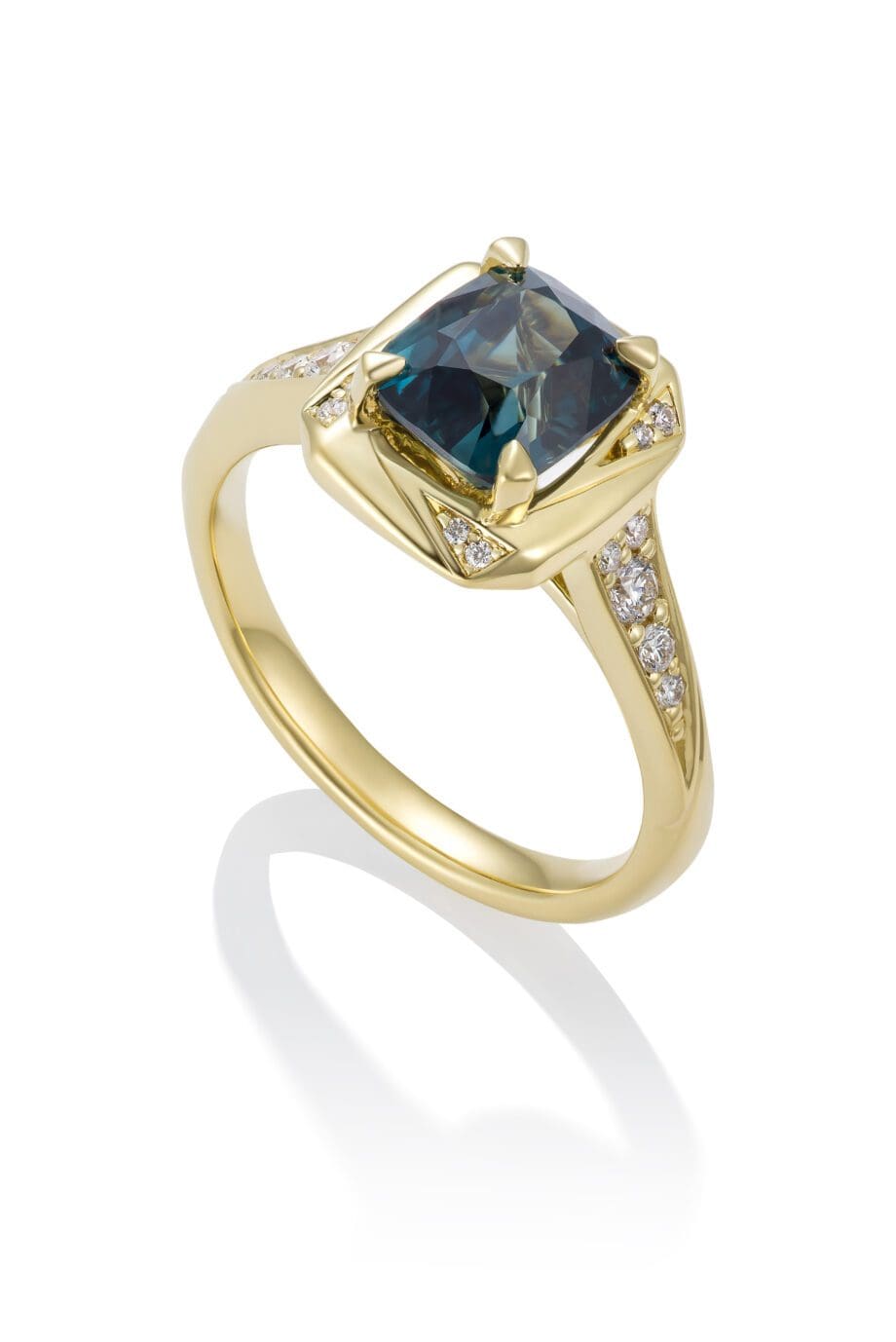 Teal sapphire and gold ring
