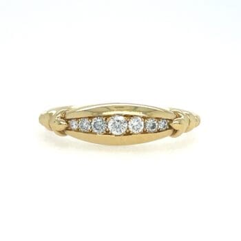 Tapered Diamond Channel band in yellow gold