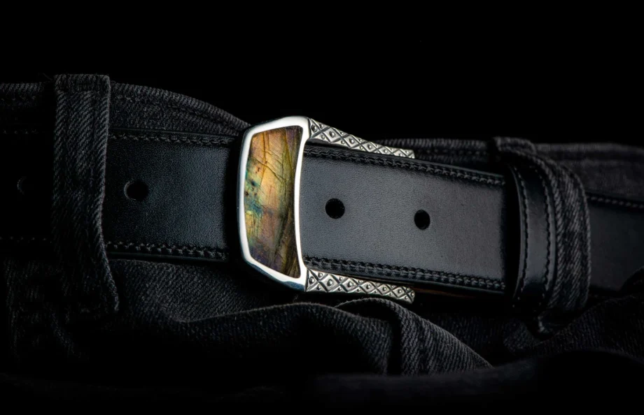 William Henry Belt Buckle 3 - Labradorite on a black belt buckled onto black pants