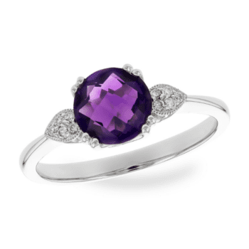 Amethyst and Diamond Ring with a Round faceted Amethyst set with four double prongs and features a pear shaped cluster of round diamonds on the sides in 14k white gold.