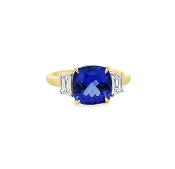 Tanzanite and diamond ring in 14k yellow gold.