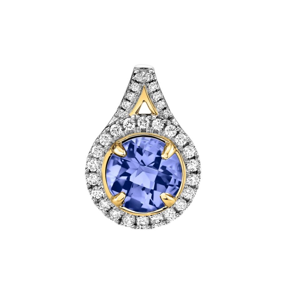 Tanzanite and diamond halo pendant in 14k white and yellow gold. Chain sold separately