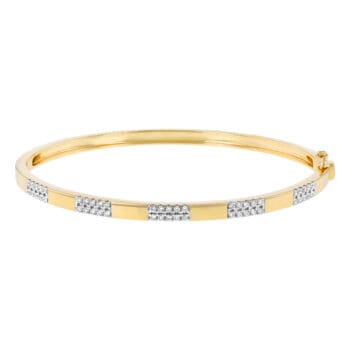 Alternating Pavé Diamond Hinged Bangle in 14k yellow gold.