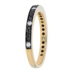 Black & White Diamond Band - Yellow gold diamond band with alternating black and white diamonds in a shared prong setting with milgrain and black rhodium detailing. side view