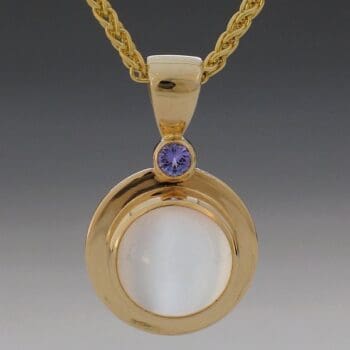 Cat's Eye Moonstone and Tanzanite Pendant in yellow gold