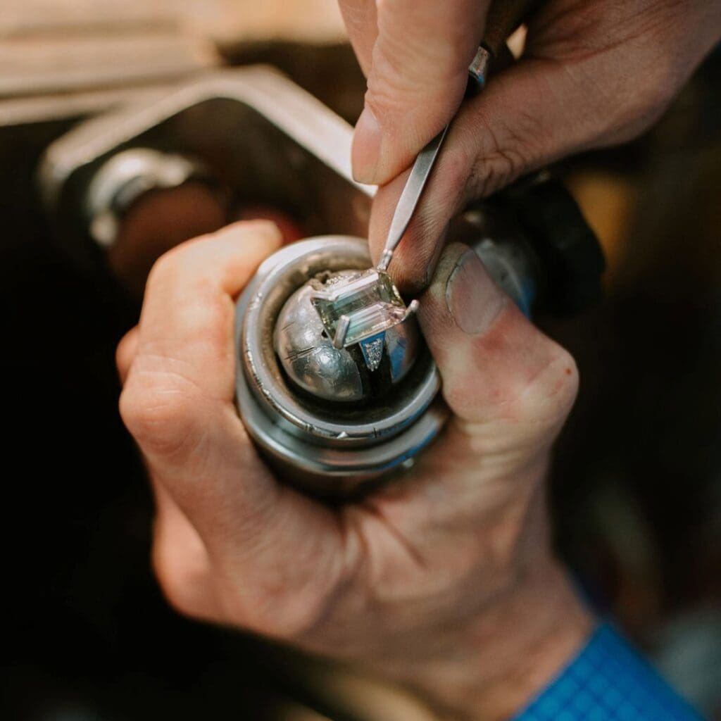 Jeweler in process of Ring Retipping & Repronging​