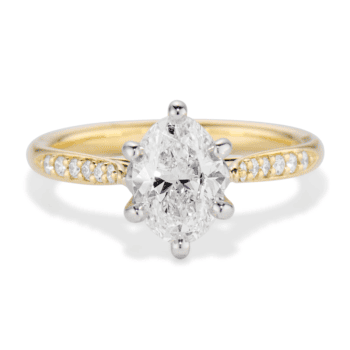Oval diamond engagement ring with 1.50ct center diamond, golden sapphire accent, 12 side diamonds, and mixed 18K yellow gold and platinum band