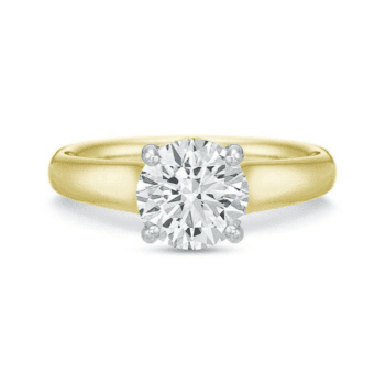 Round diamond solitaire engagement ring in 18K yellow gold band with platinum diamond setting