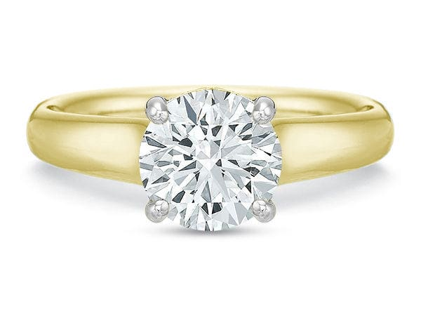Round diamond solitaire engagement ring in 18K yellow gold band with platinum diamond setting
