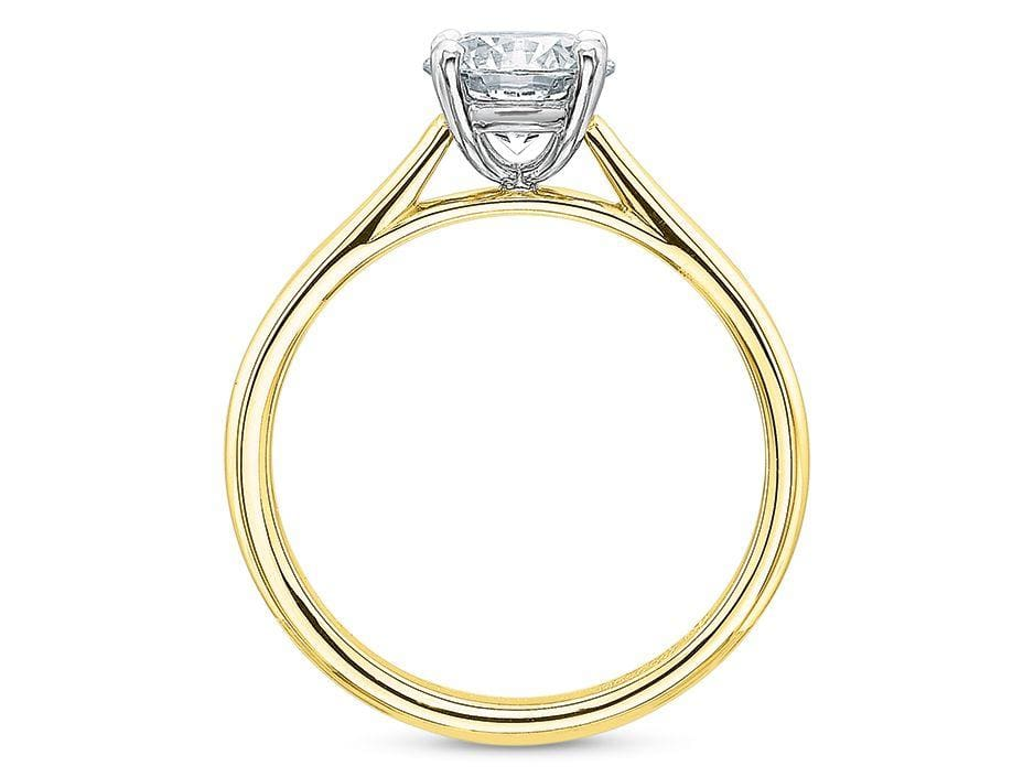 Engagement ring in 18K yellow gold and platinum featuring a 0.71ct round diamond solitaire