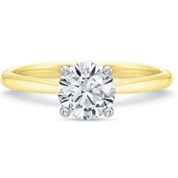 Engagement ring in 18K yellow gold and platinum featuring a 0.71ct round diamond solitaire