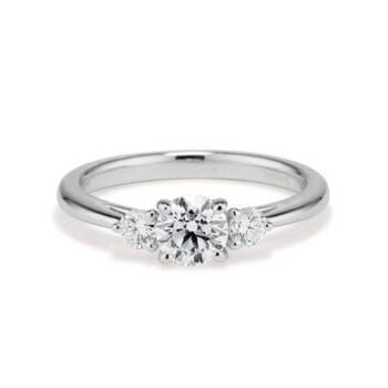 Platinum engagement ring with 0.60 carat round brilliant diamond center and 0.21 carats side diamonds