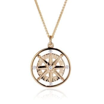 Compass Rose pendant in 14K yellow gold featuring five round brilliant diamonds set with bead setting