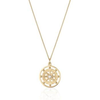 Compass Rose Large Pendant in 14K yellow gold featuring a round center diamond within a round frame