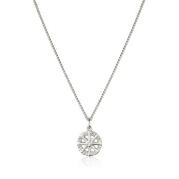 Compass Rose pendant in 14K white gold featuring a round center diamond
