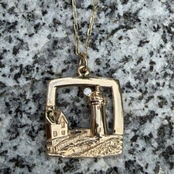 Nubble Lighthouse Pendant in 14K yellow gold with a round diamond accent