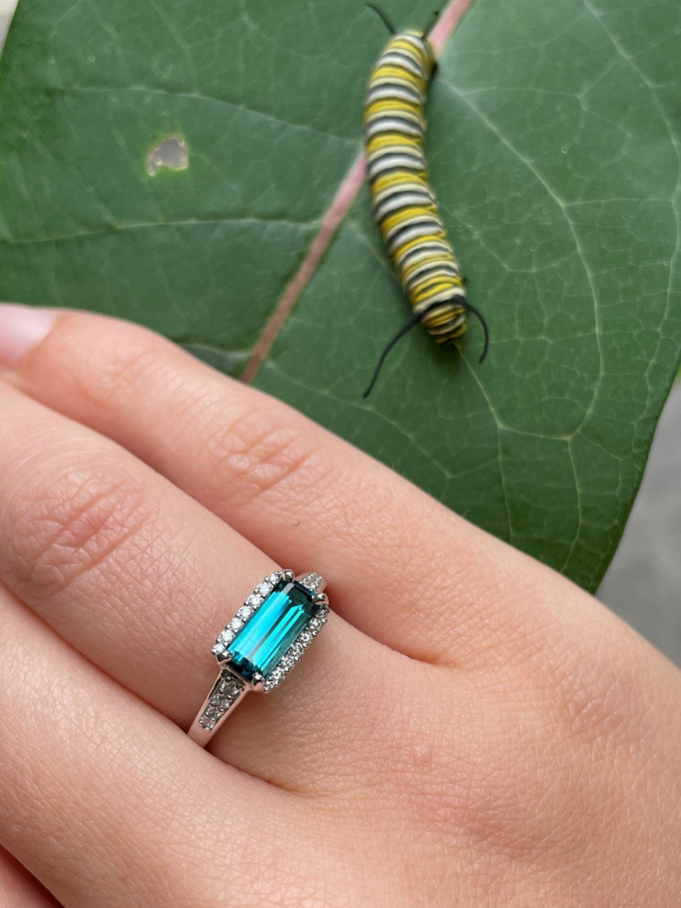 Indicolite blue tourmaline ring with emerald cut diamonds set in 14K white gold, size 6.5