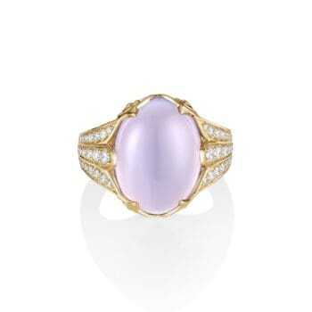 Purple chalcedony ring with diamond accents set in 14K yellow gold featuring oval diamond details