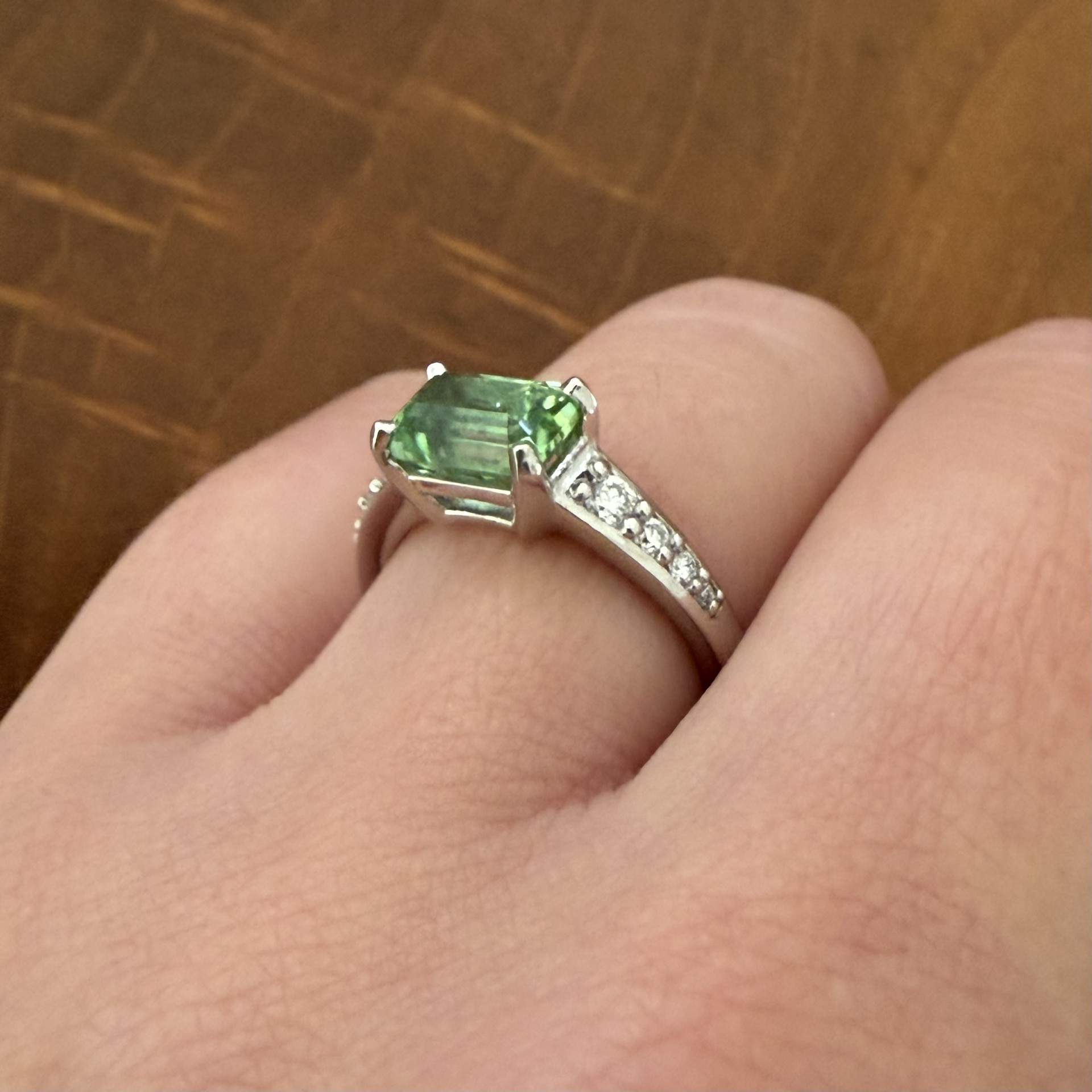 New Horizon ring featuring a mint green tourmaline and radiant cut diamonds set in platinum