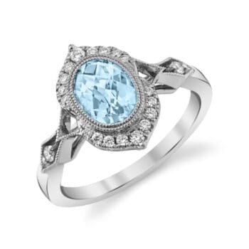 Aquamarine halo ring with light blue center gemstone surrounded by oval diamonds in 14K white gold