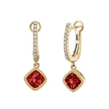 14K yellow gold huggie hoop earrings with cushion cut red garnet centers and diamond accents
