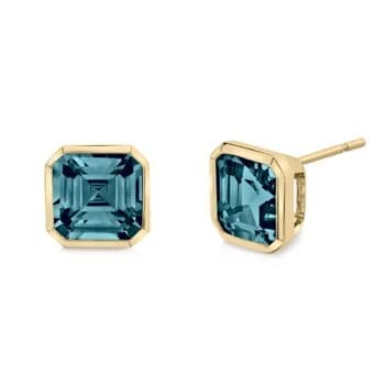 Teal blue topaz hexagonal stud earrings set in 14K yellow gold