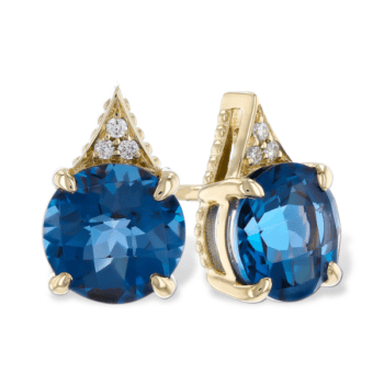 Blue topaz stud earrings with diamond trio in 14K yellow gold