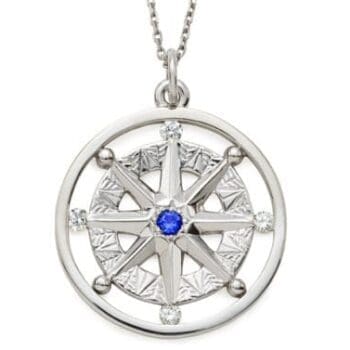 14K white gold Compass Rose pendant with blue sapphire center and four round brilliant diamonds
