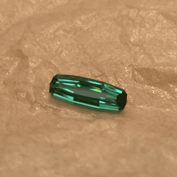 Deep green elongated cushion cut tourmaline loose gemstone weighing 1.91 carats mined in Maine
