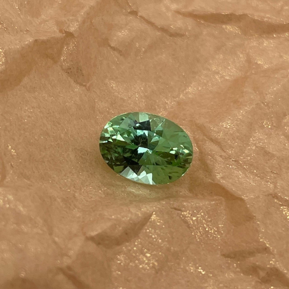 Oval mint green seasoned Maine tourmaline gemstone weighing 2.81 carats