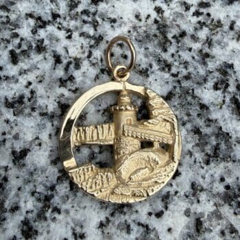 Lighthouse pendant crafted in polished 14K yellow gold