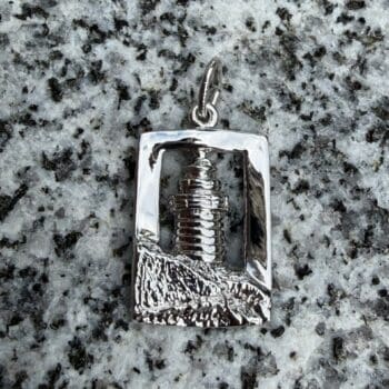 Sterling silver charm shaped as West Quoddy Lighthouse