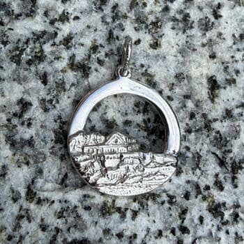 Sterling silver charm shaped like Eagle Island Lighthouse