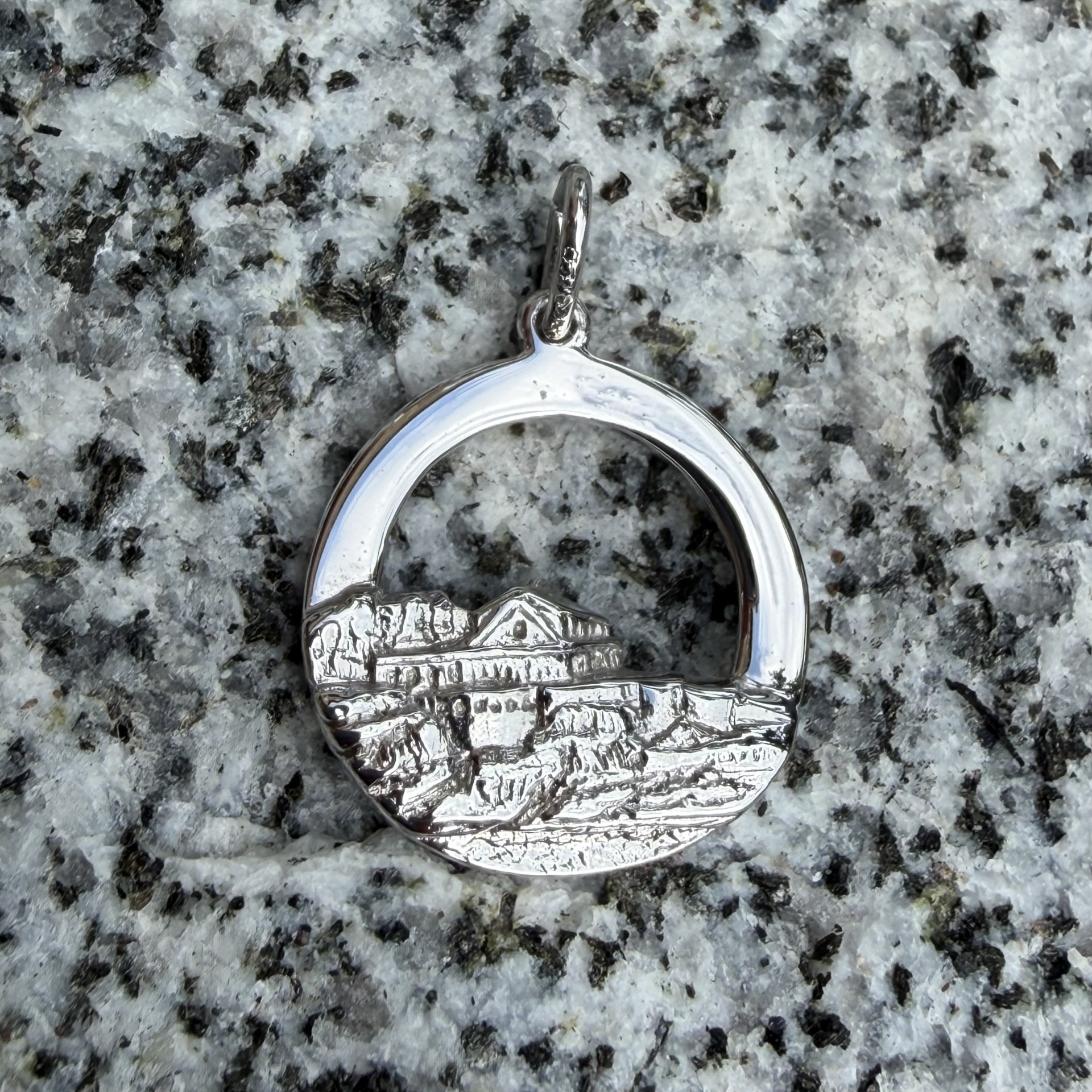 Sterling silver charm shaped like Eagle Island Lighthouse