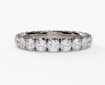 Diamond pavé half-way band in polished platinum with delicate diamonds