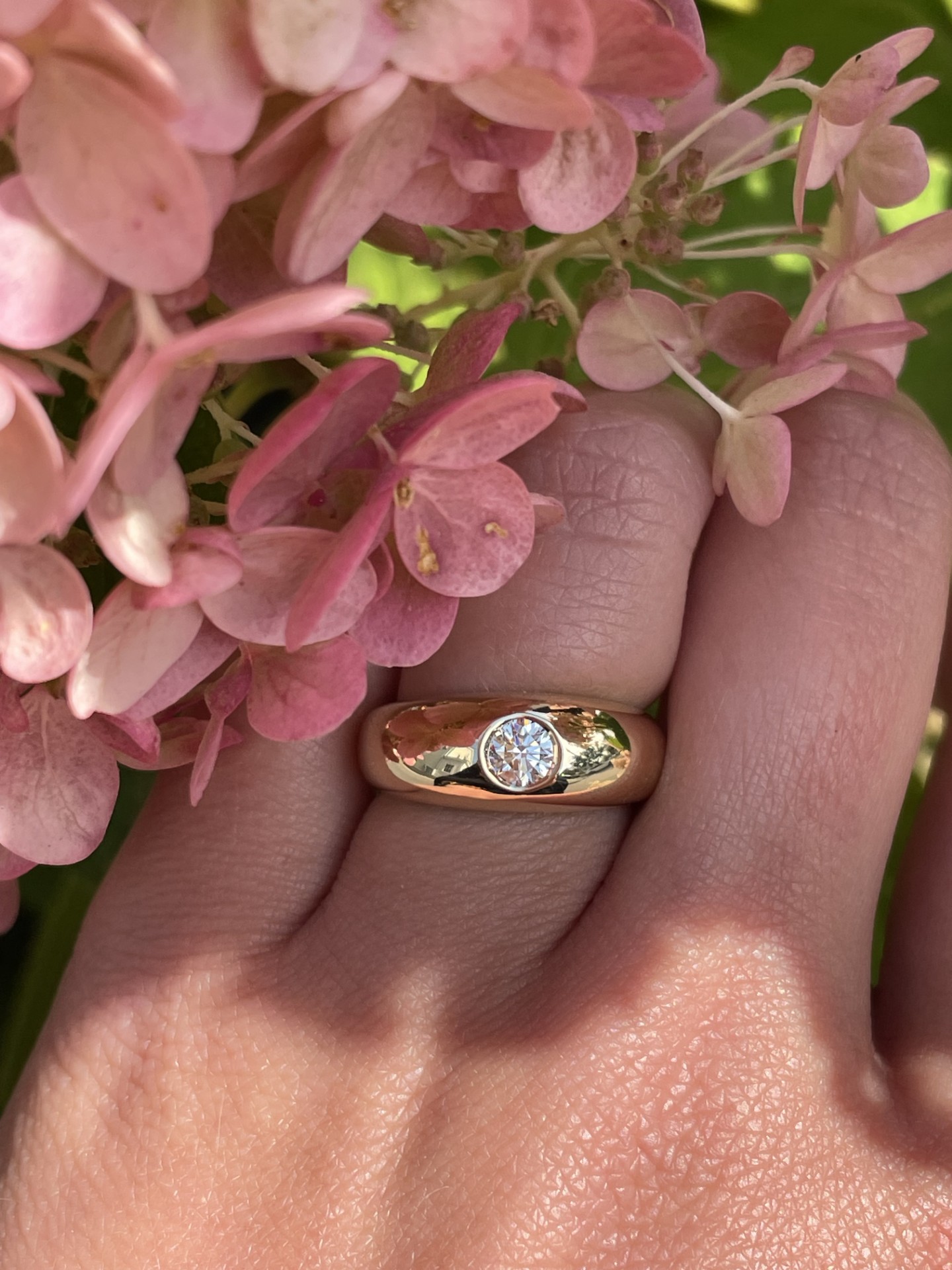 Round Diamond Dome Ring in 14K Yellow Gold featuring a flush-set round diamond