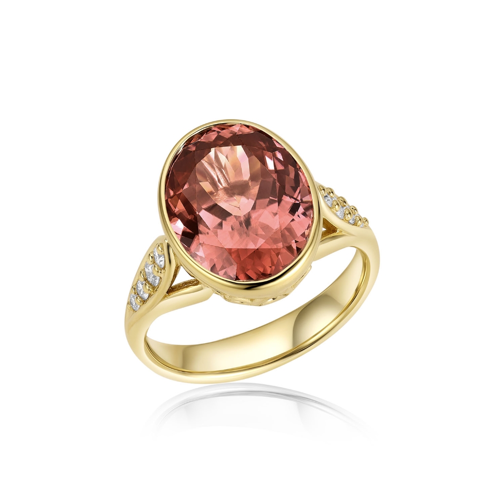 Pink Zircon Concerto Ring set in 14K Yellow Gold, showcasing vibrant pink gemstone