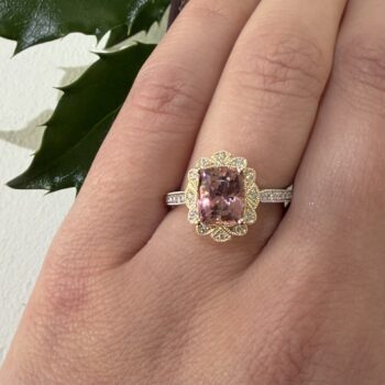 14K two tone gold ring with light pink elongated cushion cut tourmaline center and diamond halo