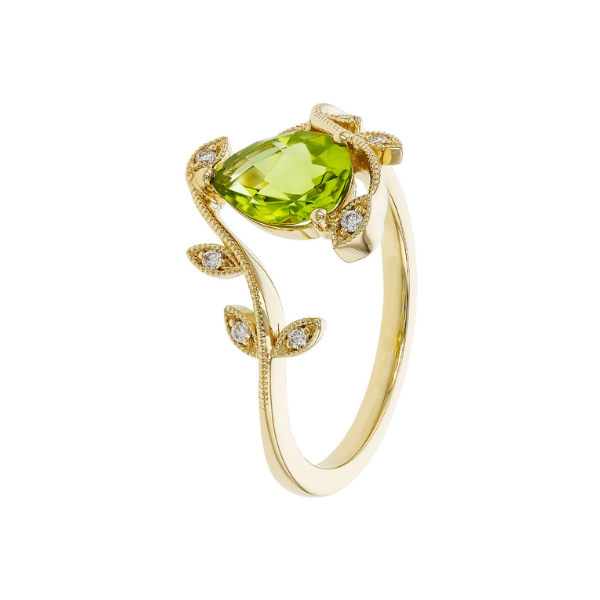 14K yellow gold ring with pear-shaped lime green peridot and pear-shaped diamonds