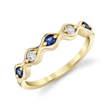 Blue sapphire round gemstone ring with two round diamond accents in 14K yellow gold
