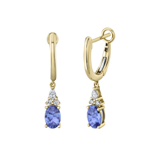 Tanzanite and diamond drop huggie hoop earrings set in 14K yellow gold featuring oval blue-purple tanzanite gemstones