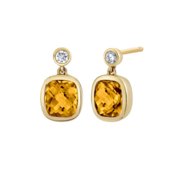 Orange citrine stud earrings with elongated cushion cut gemstones set in 14K yellow gold with diamond accents