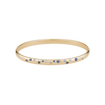 14K yellow gold galaxy bangle featuring round blue sapphires and brilliant diamonds
