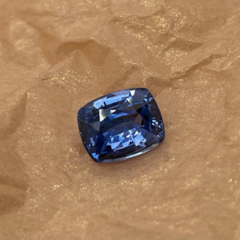 2.38 carat cushion cut blue sapphire gemstone with deep vivid blue color